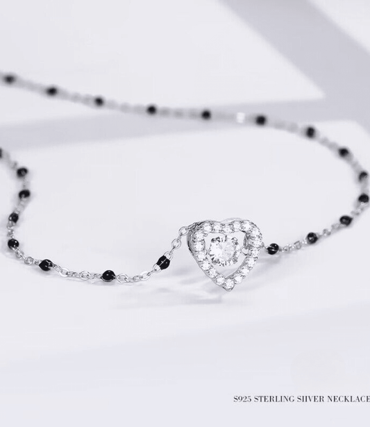 Eternal Heartbeat Necklace - Heart pendant showcased beautifully. ✨💖