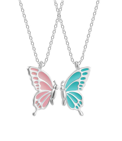 White chain butterfly necklace displayed.